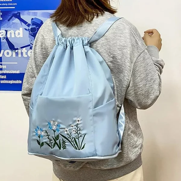 2ea39306-396a-471d-87fe-118de9131e52.webp Floral Embroidery Drawstring Backpack for Women