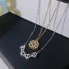 552ecbfb-e28e-4f3e-b7ce-b054fa75755c.webp 2-in-1 Magnetic Four Leaf Clover Heart Gold Necklace