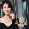 a8aad97e-7bb6-46a2-8902-e9044814459b.webp 2-in-1 Magnetic Four Leaf Clover Heart Gold Necklace